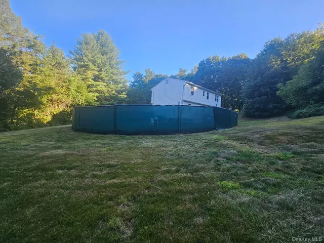 a view of a barn with a yard