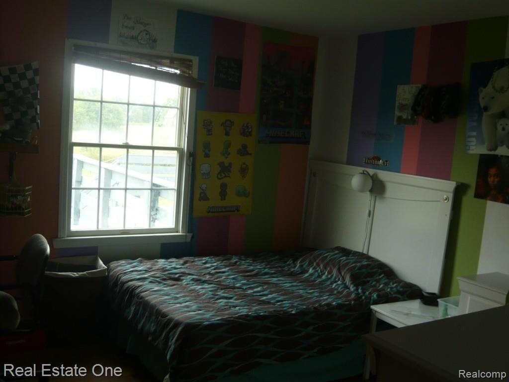 2443 Burke Road Fowlerville, MI 48836 - Photo 14 of 24 4th Bedroom.jpg