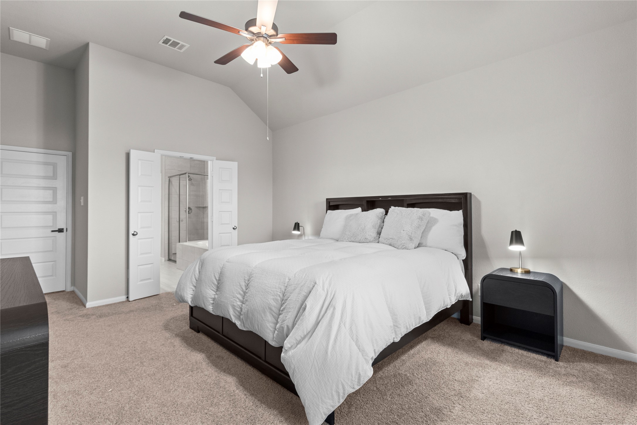 2811 Bisbee Road League City, TX 77573 - Photo 11 of 28 a bedroom with bed and a chandelier
