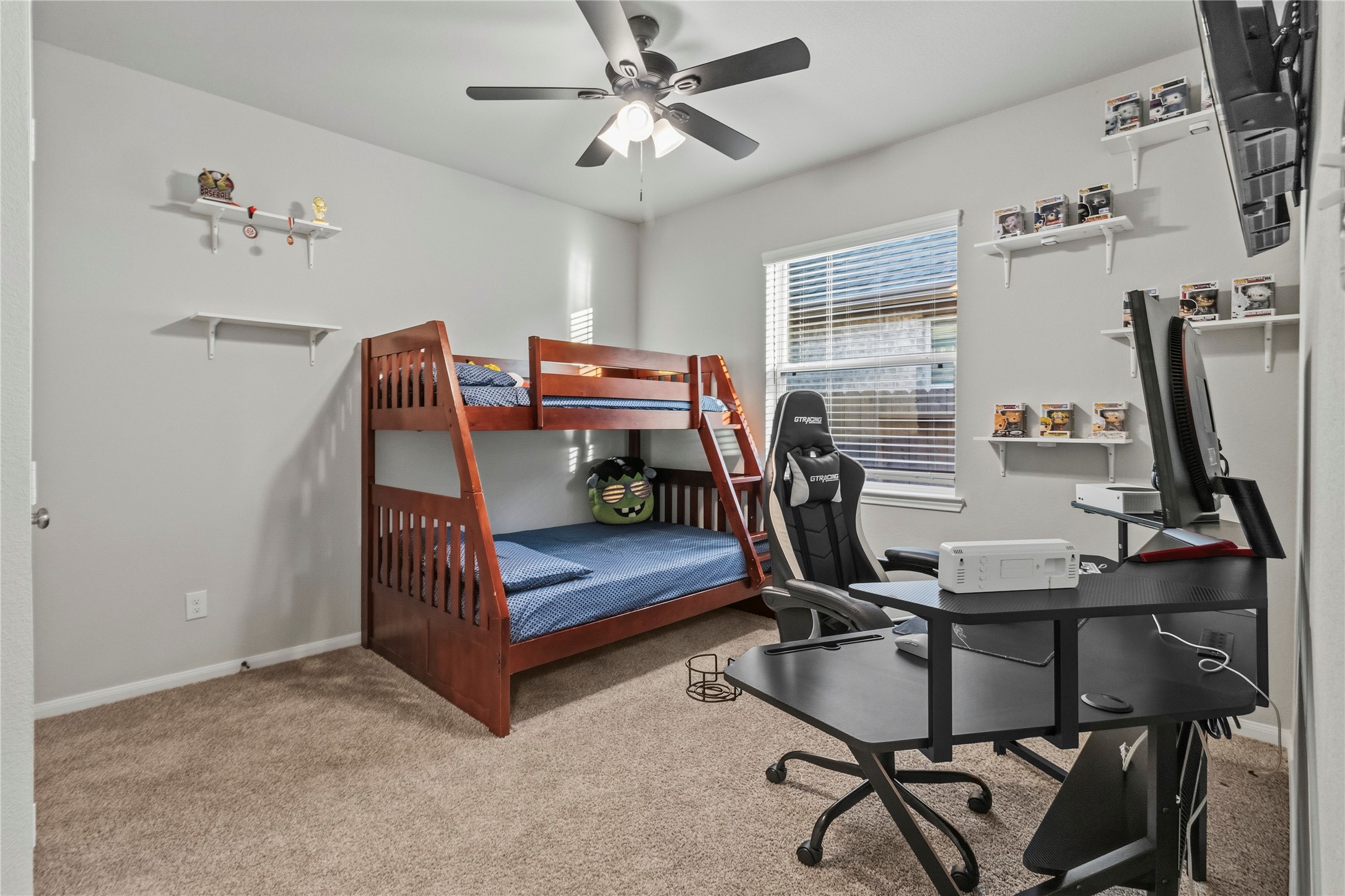 2811 Bisbee Road League City, TX 77573 - Photo 18 of 28 a view of a workspace with furniture and a window