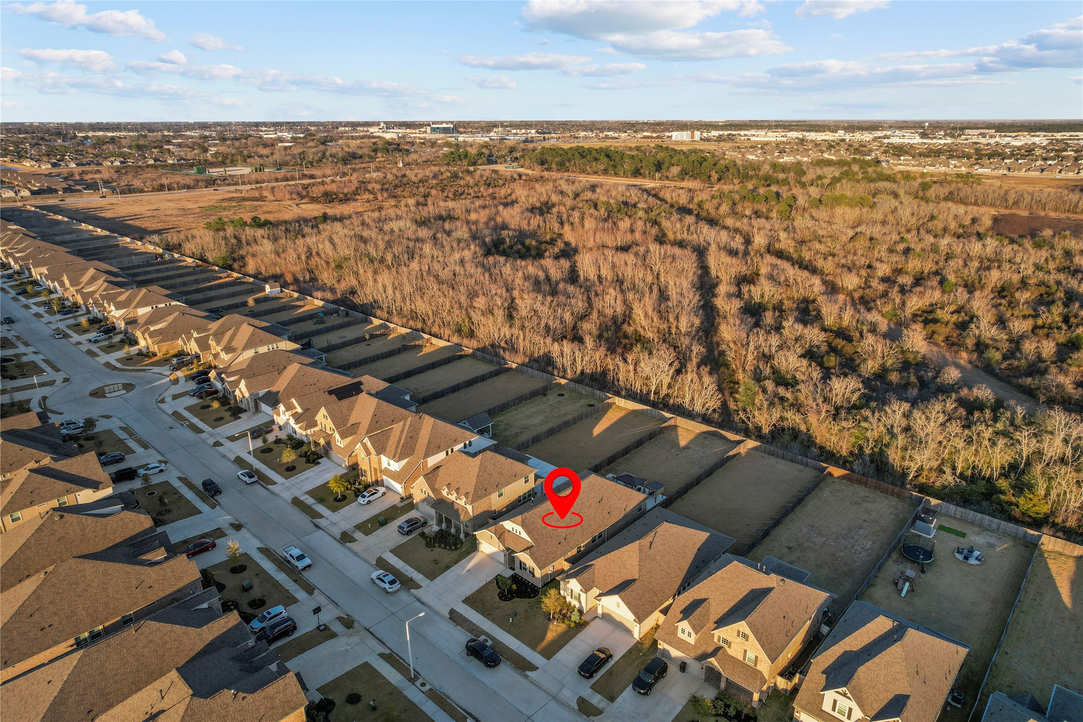 2811 Bisbee Road League City, TX 77573 - Photo 25 of 28 an aerial view of residential houses with outdoor space