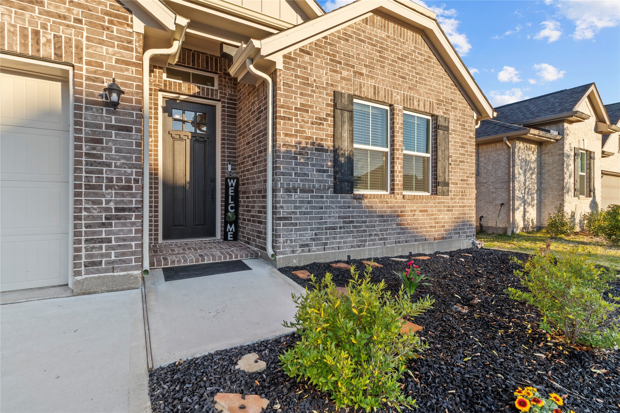 2811 Bisbee Road League City, TX 77573 - Photo 27 of 28 a view of a brick house with a large windows