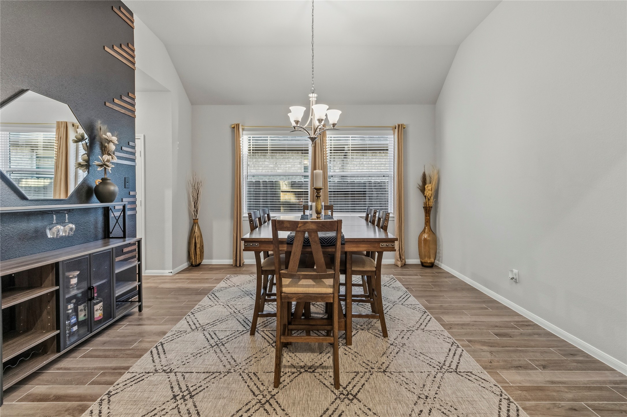 2811 Bisbee Road League City, TX 77573 - Photo 6 of 28 a view of a dining room with furniture and chandelier