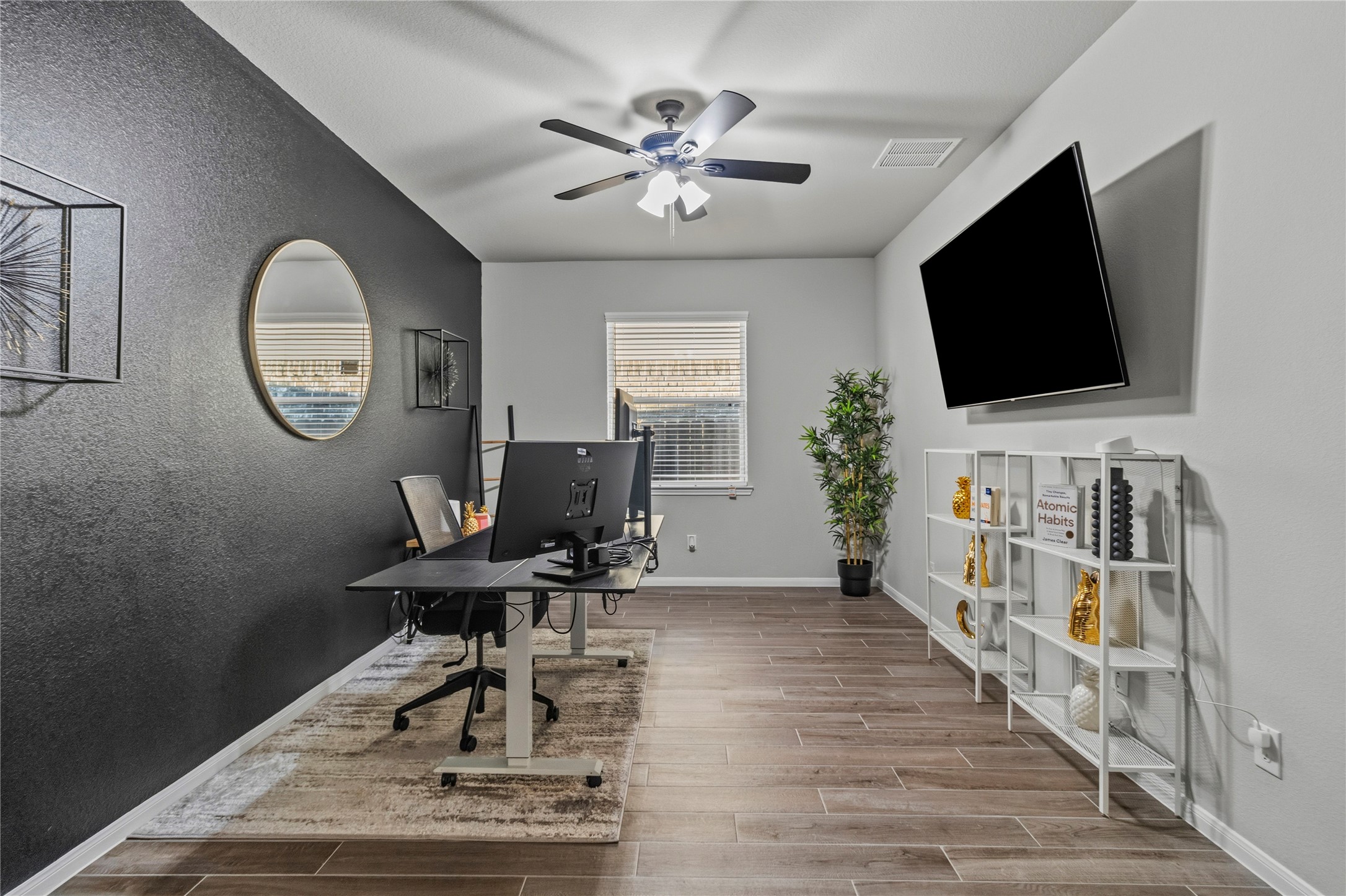 2811 Bisbee Road League City, TX 77573 - Photo 9 of 28 a workspace with wooden floor and a window