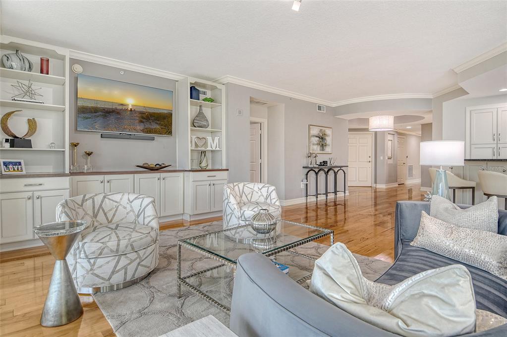401 North Point Road, Unit 304 Osprey, FL 34229 - Photo 23 of 95 a living room with furniture and wooden floor