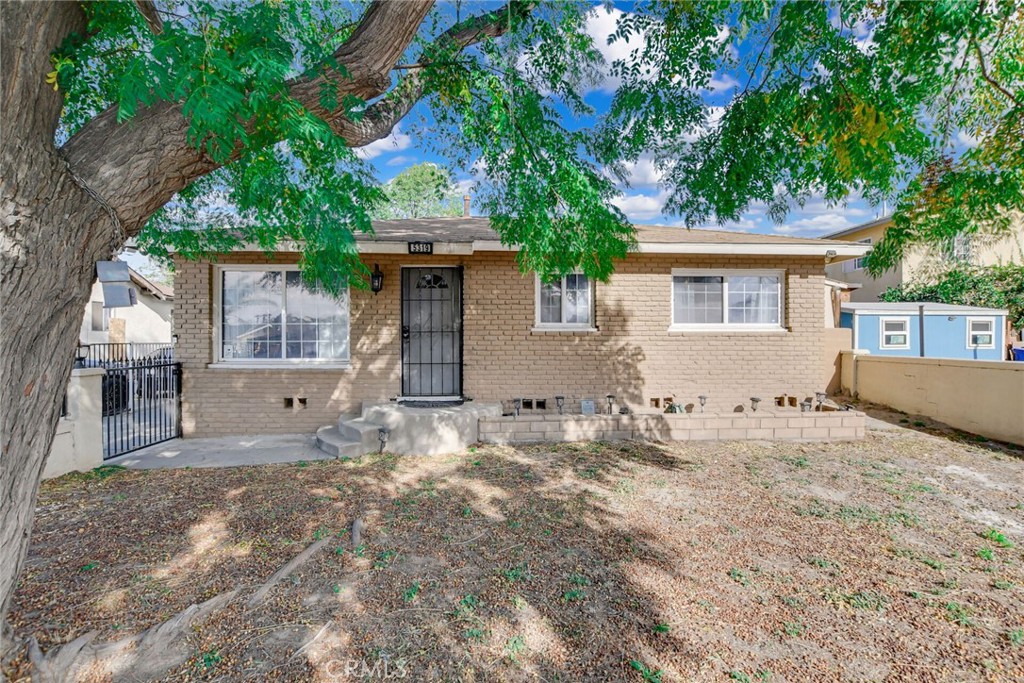 5319 35th Street Riverside, CA 92509 - Photo 1 of 1 front view of a house with a yard