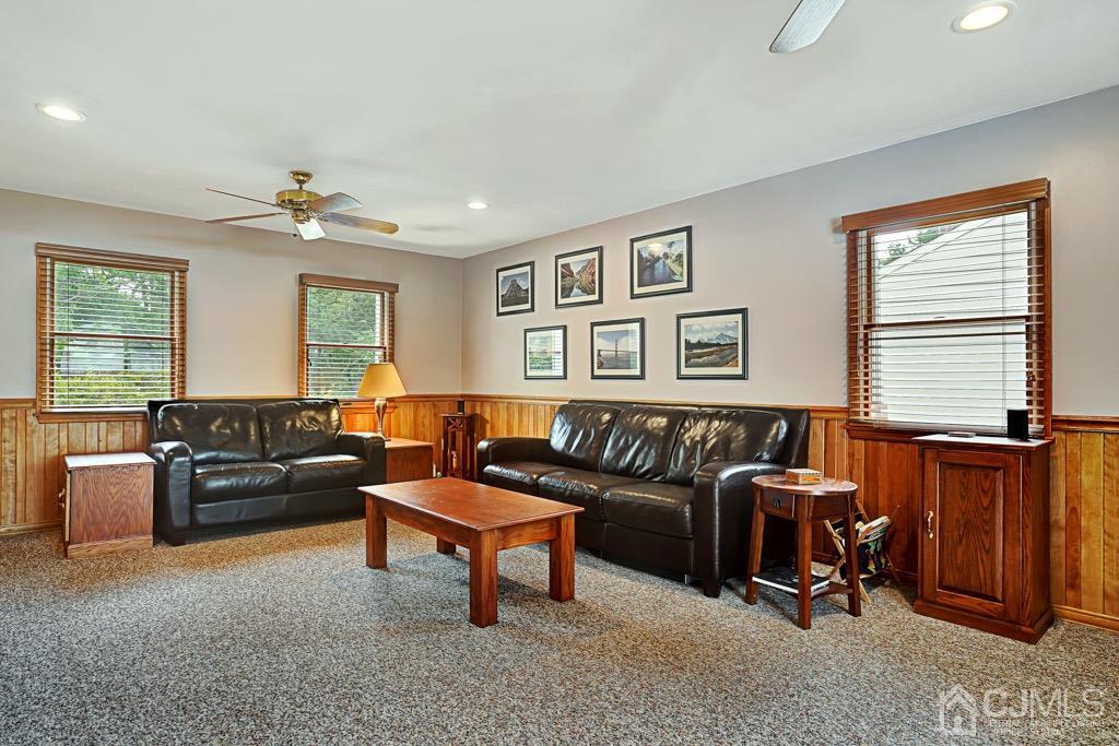 210 Oak Drive Middlesex, NJ 08846 - Photo 14 of 27 a living room with furniture and a window
