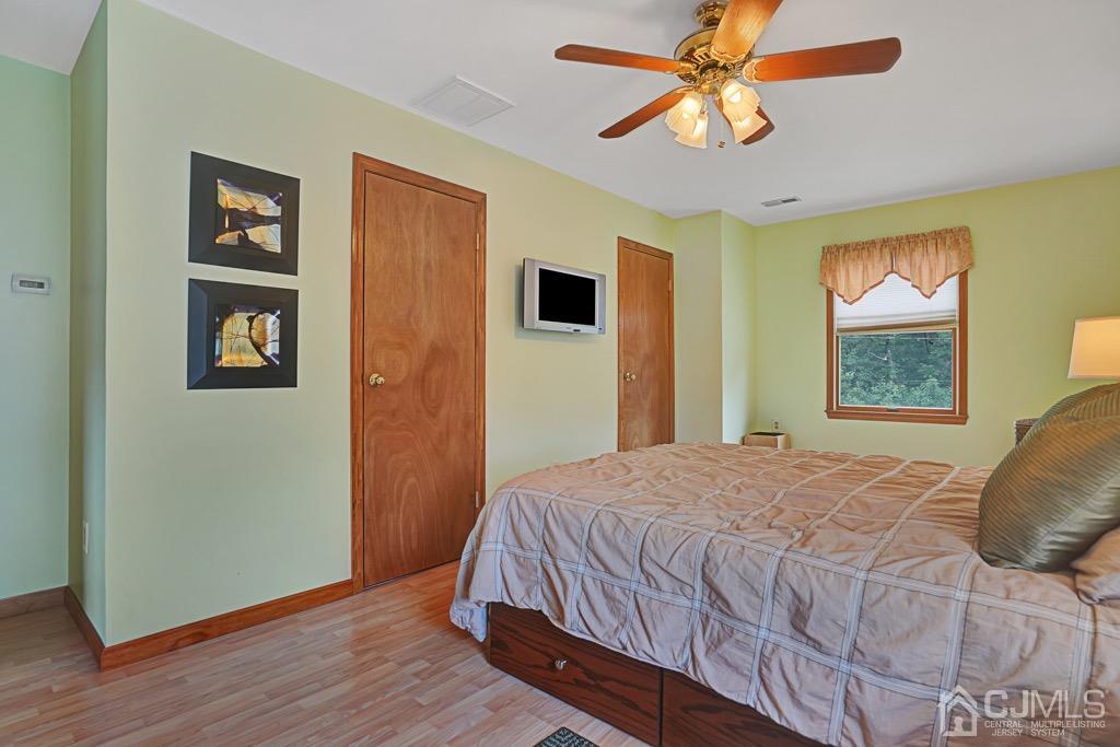 210 Oak Drive Middlesex, NJ 08846 - Photo 17 of 27 a bedroom with a bed and a window