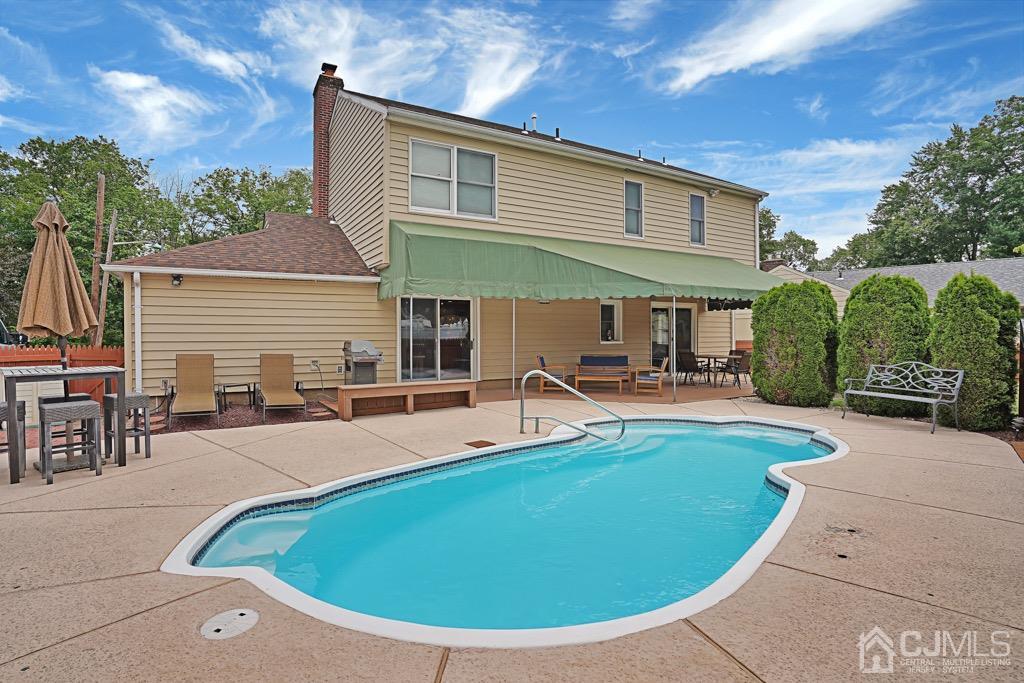 210 Oak Drive Middlesex, NJ 08846 - Photo 24 of 27 a view of a house with swimming pool and sitting area