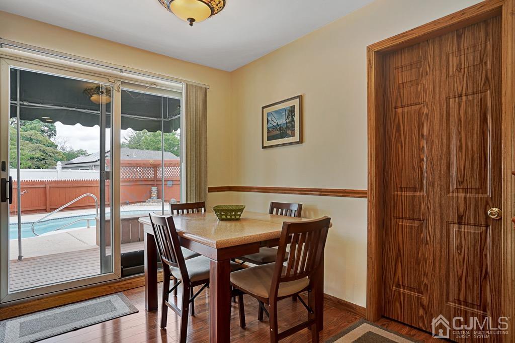 210 Oak Drive Middlesex, NJ 08846 - Photo 10 of 27 a view of a dining room with furniture window and outside view