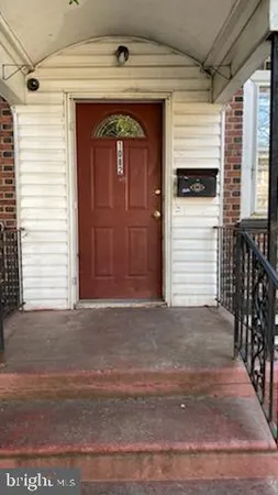 a front view of a house with a garage