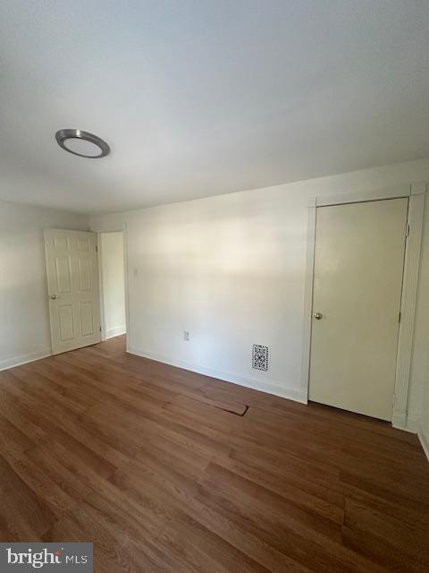 1082 Trent Road Camden, NJ 08104 - Photo 7 of 9 a view of empty room with wooden floor and fan