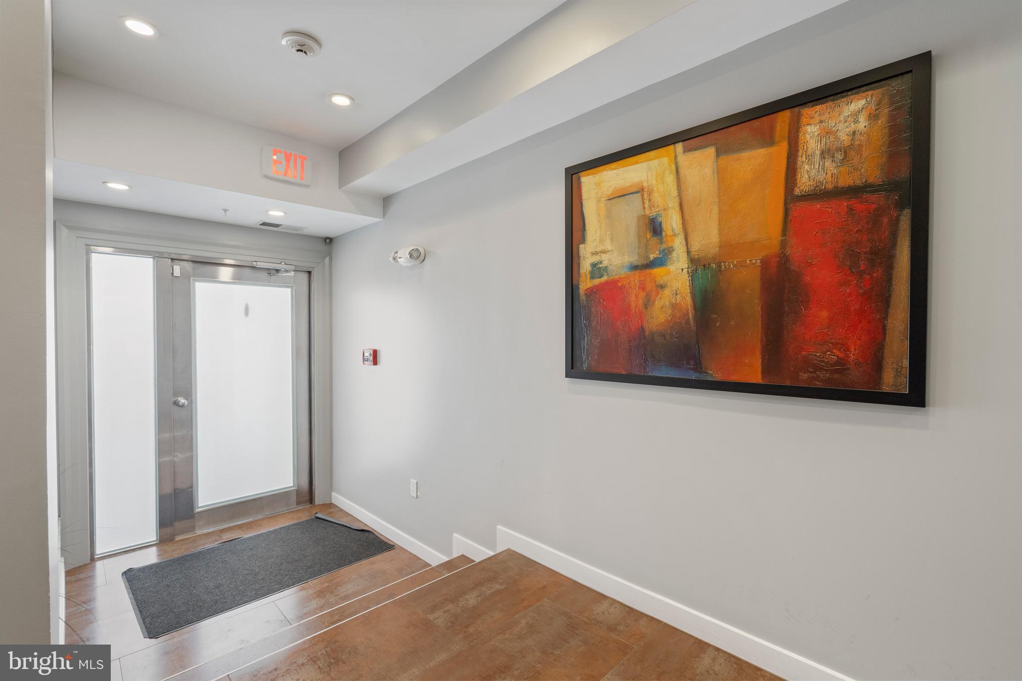 1466 Harvard Street Northwest, Unit A2 Washington, DC 20009 - Photo 26 of 31 a view of an empty room with a window