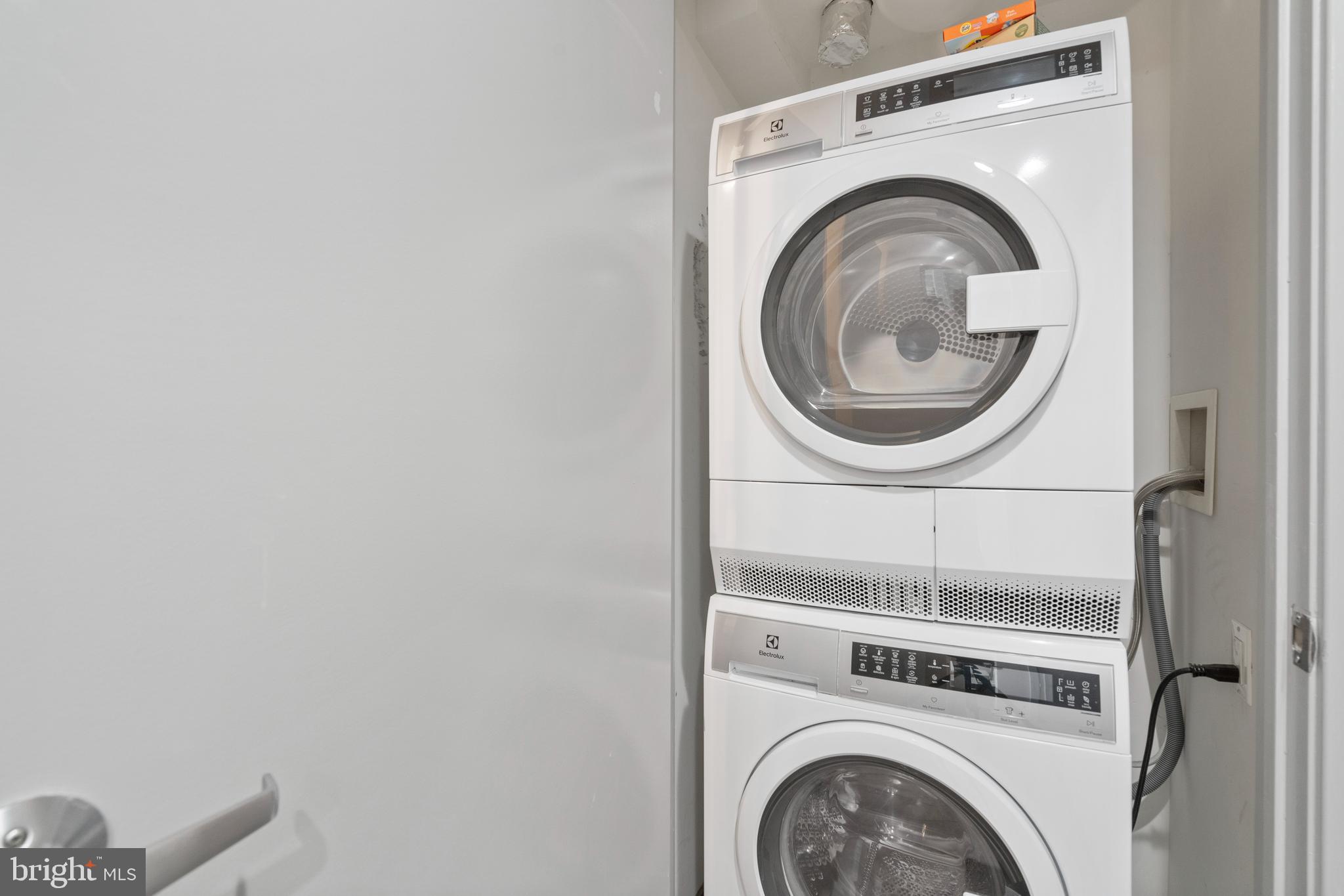 1466 Harvard Street Northwest, Unit A2 Washington, DC 20009 - Photo 31 of 31 a close up view of a washer and dryer