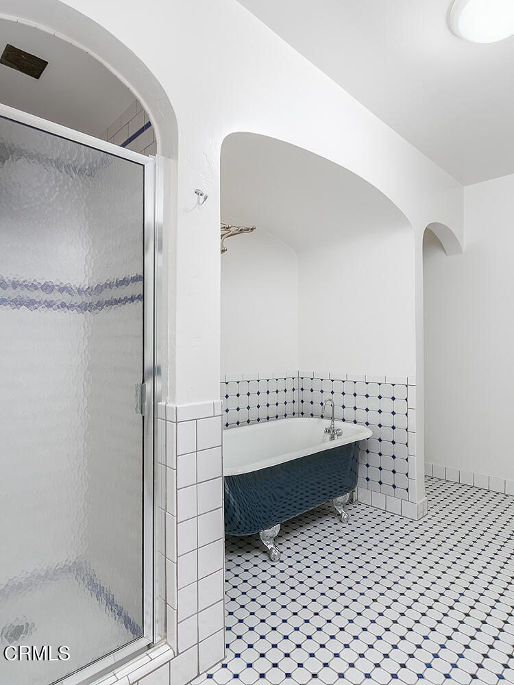 5240 Ellenwood Place Los Angeles, CA 90041 - Photo 16 of 25 a bathroom with a sink a toilet and shower