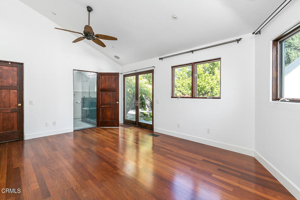 5240 Ellenwood Place Los Angeles, CA 90041 - Photo 20 of 25 a view of an empty room with a window and wooden floor