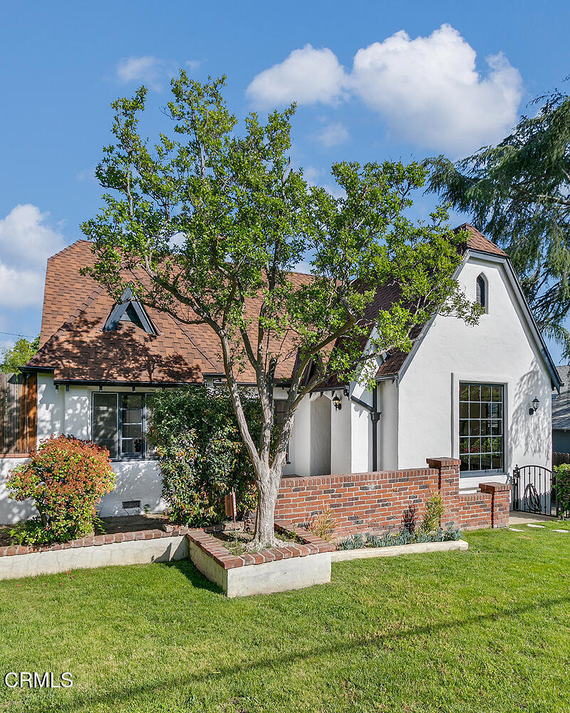 5240 Ellenwood Place Los Angeles, CA 90041 - Photo 2 of 25 a front view of a house with a yard