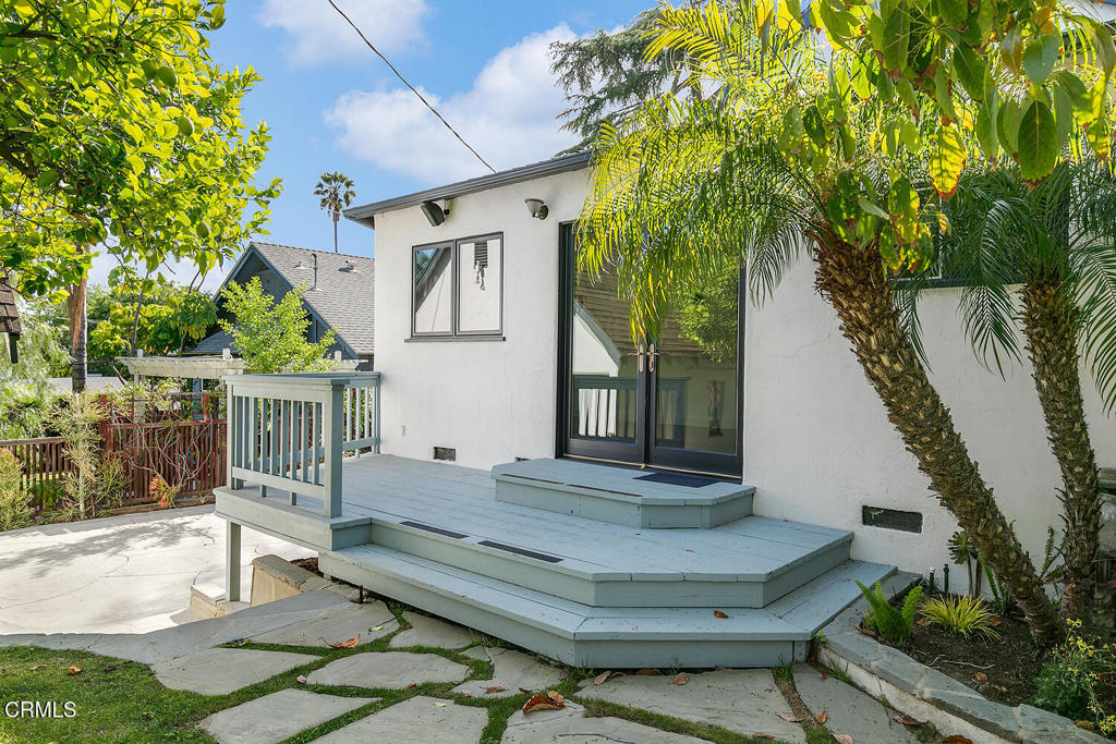 5240 Ellenwood Place Los Angeles, CA 90041 - Photo 22 of 25 a view of house with wooden deck and a backyard