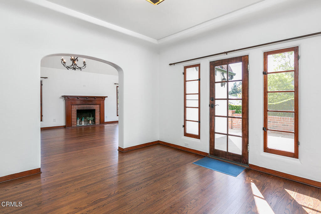 5240 Ellenwood Place Los Angeles, CA 90041 - Photo 6 of 25 wooden floor fireplace and windows in an empty room