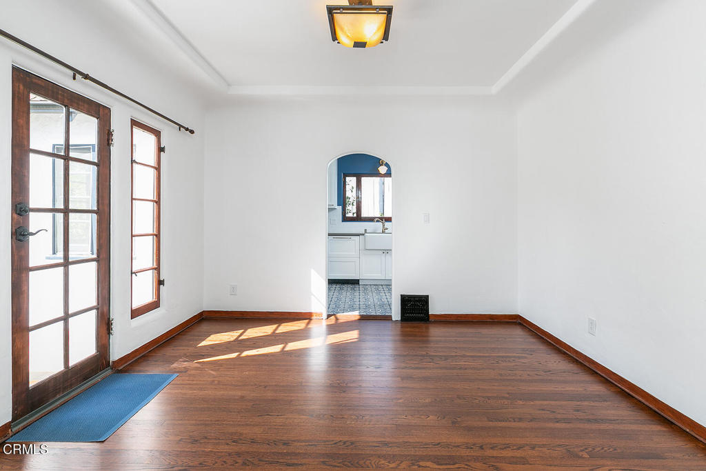 5240 Ellenwood Place Los Angeles, CA 90041 - Photo 7 of 25 a view of empty room with wooden floor and fan
