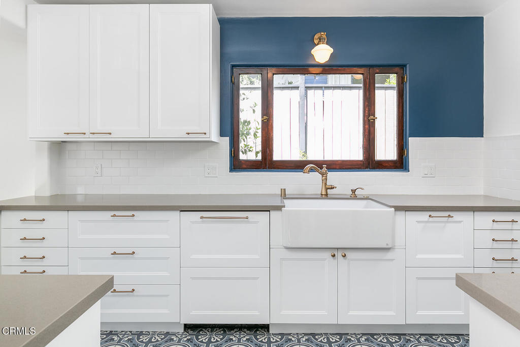 5240 Ellenwood Place Los Angeles, CA 90041 - Photo 8 of 25 a kitchen with cabinets appliances and a sink