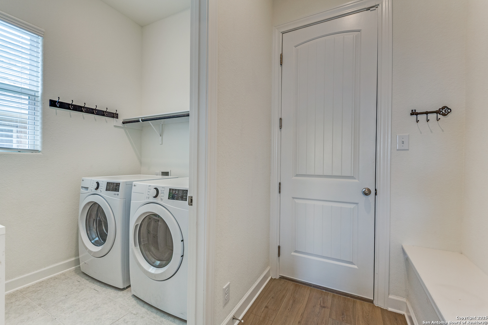 390 Rhapsody View Spring Branch, TX 78070 - Photo 14 of 39 a utility room with dryer and washer