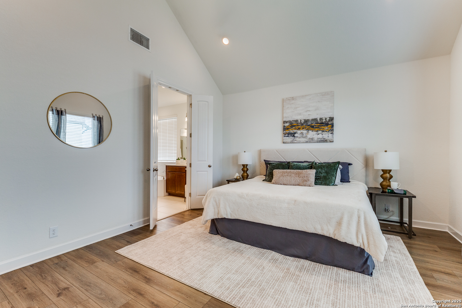 390 Rhapsody View Spring Branch, TX 78070 - Photo 17 of 39 a bedroom with a bed and a chandelier