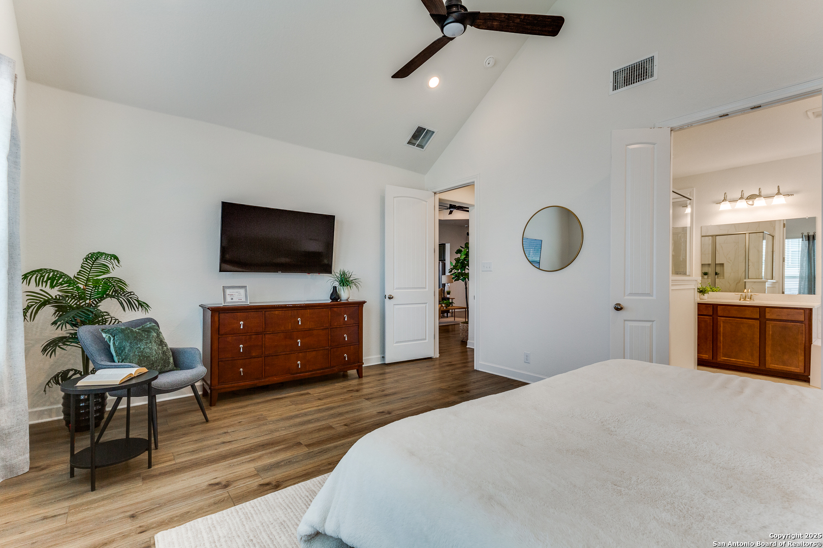 390 Rhapsody View Spring Branch, TX 78070 - Photo 18 of 39 a bedroom with furniture and a flat screen tv