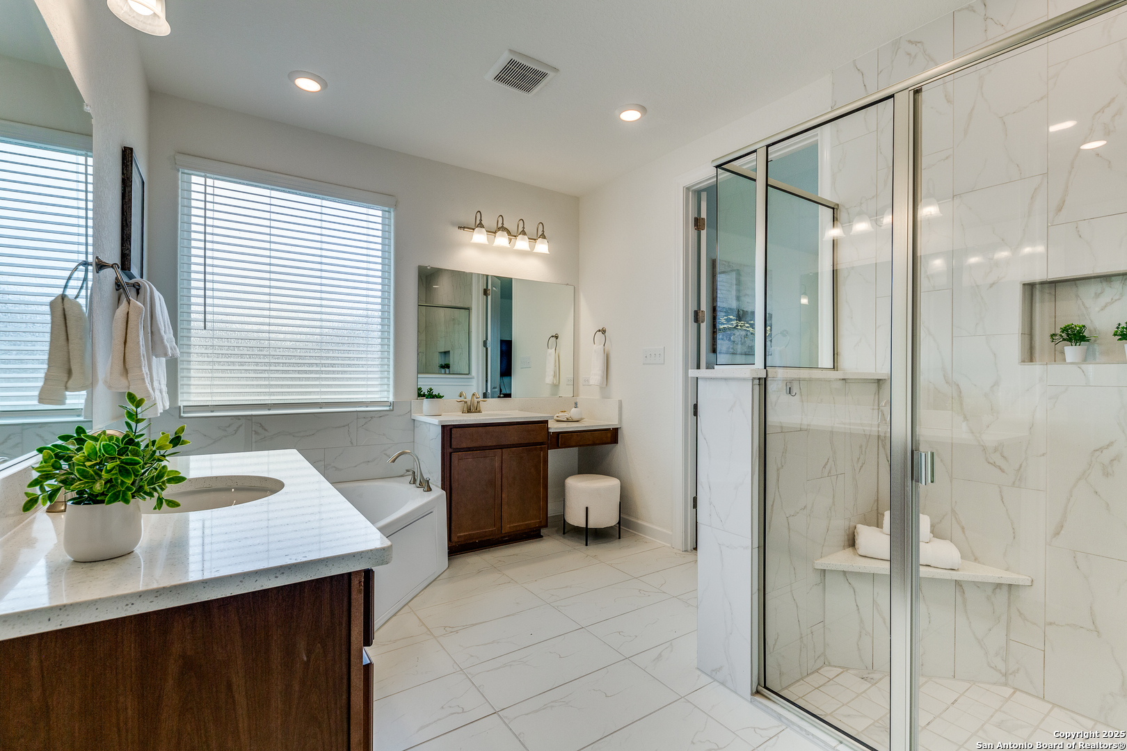 390 Rhapsody View Spring Branch, TX 78070 - Photo 20 of 39 a spacious bathroom with a shower sink and mirror
