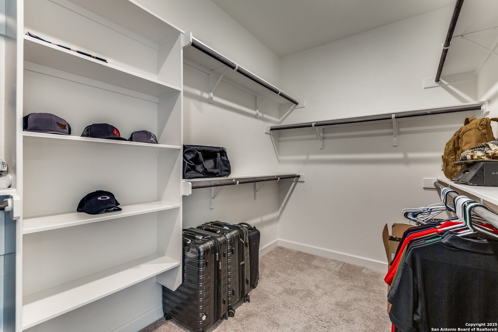 390 Rhapsody View Spring Branch, TX 78070 - Photo 21 of 39 a view of walk in closet with clothes and shoes