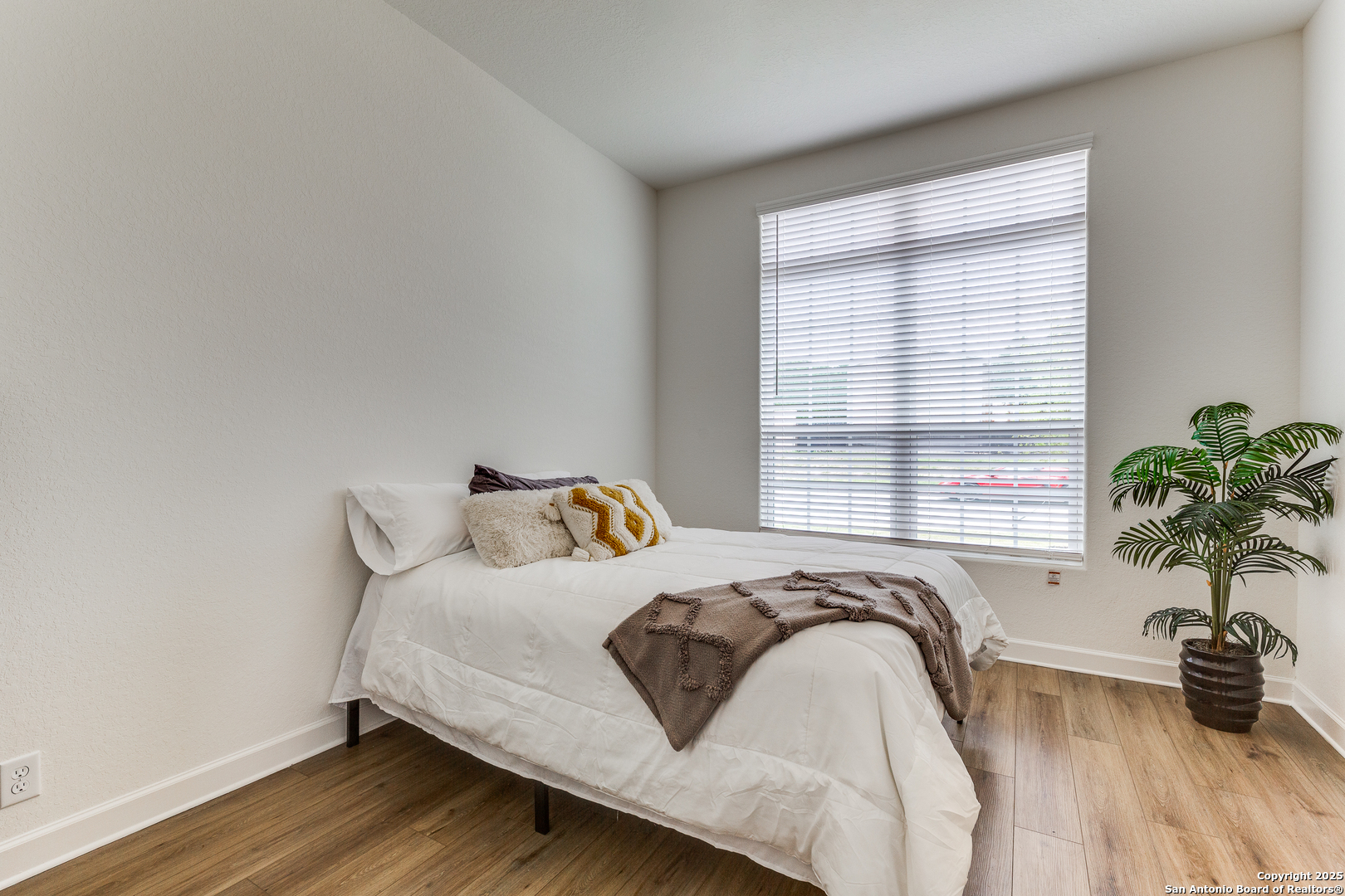 390 Rhapsody View Spring Branch, TX 78070 - Photo 22 of 39 a bedroom with a bed and a window