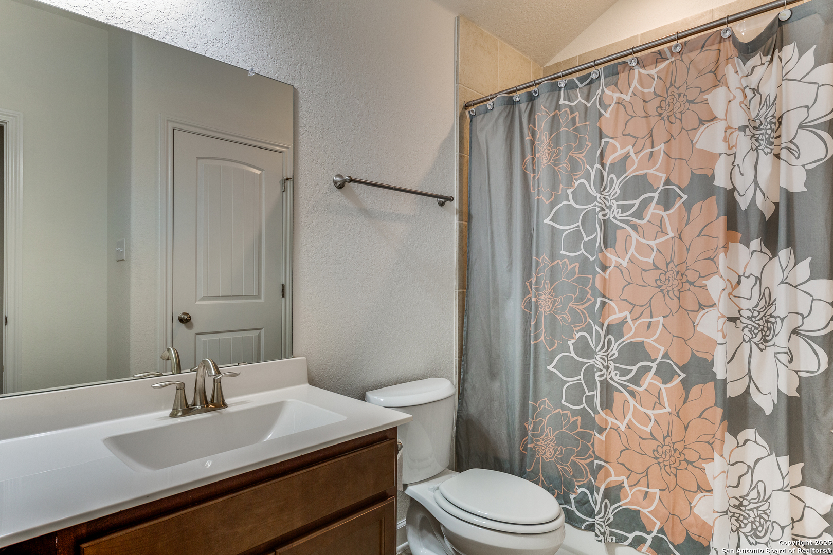 390 Rhapsody View Spring Branch, TX 78070 - Photo 31 of 39 a bathroom with a sink toilet and shower