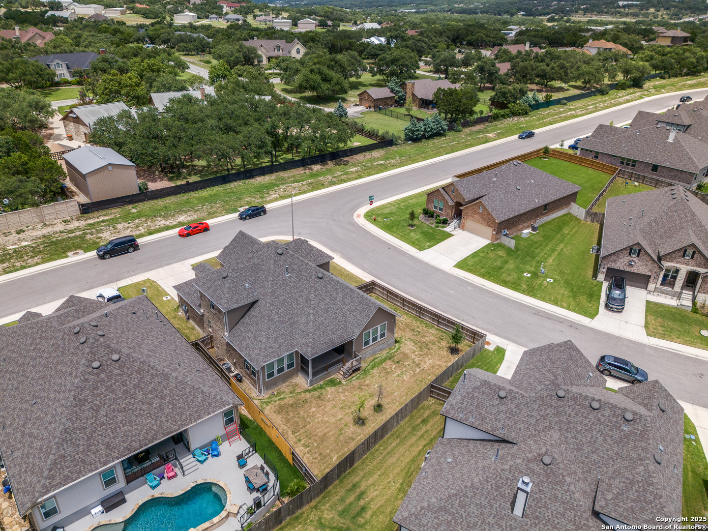 390 Rhapsody View Spring Branch, TX 78070 - Photo 36 of 39 an aerial view of a house with a garden