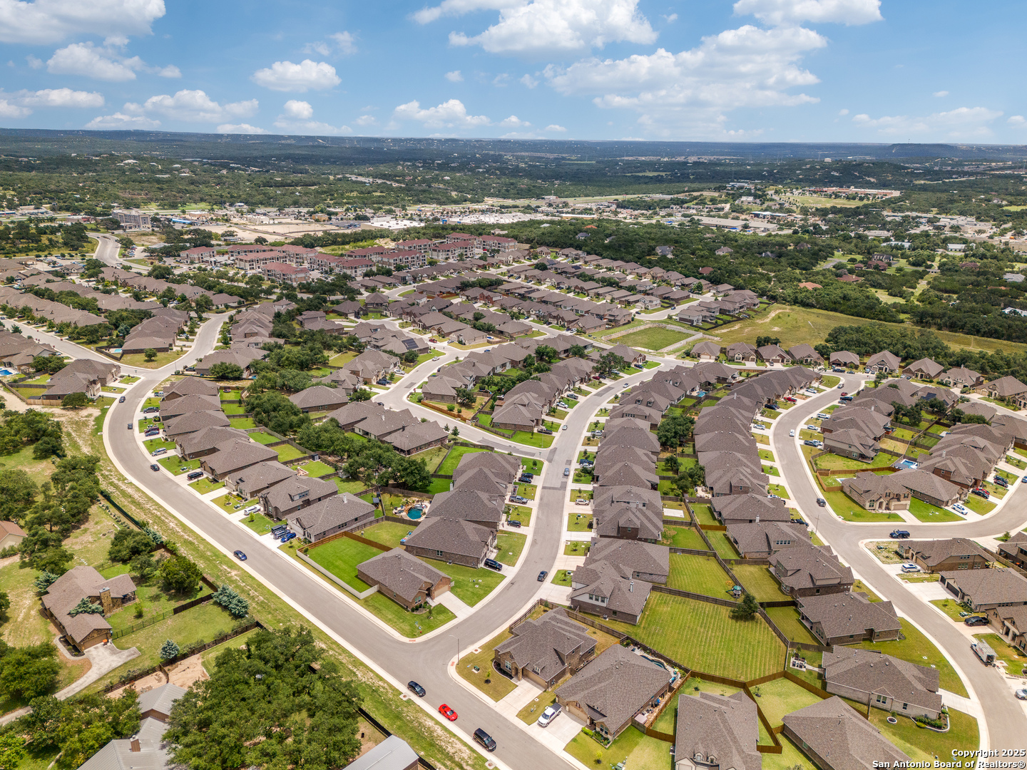 390 Rhapsody View Spring Branch, TX 78070 - Photo 37 of 39 an aerial view of residential houses with outdoor space