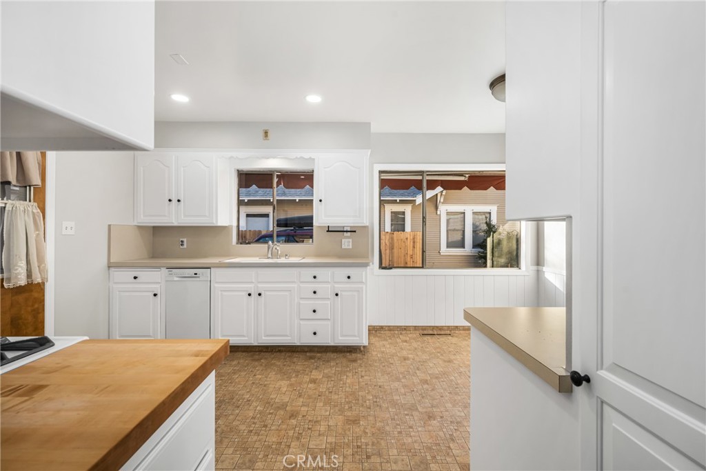 243 North Grand Street Orange, CA 92866 - Photo 12 of 25 a spacious bathroom with a granite countertop sink and a bathtub