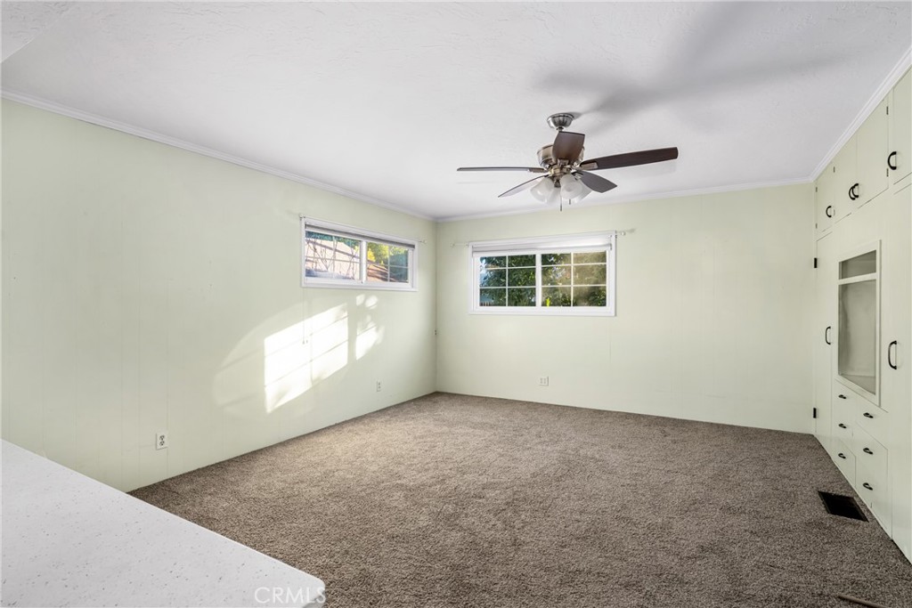 243 North Grand Street Orange, CA 92866 - Photo 18 of 25 an empty room with windows and fan