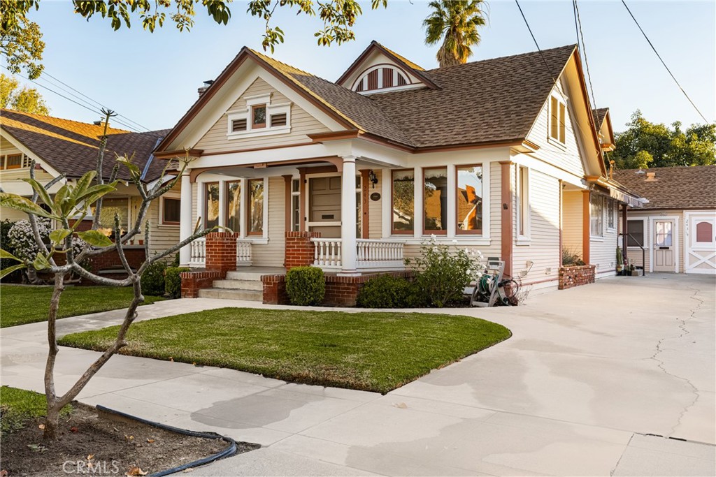 243 North Grand Street Orange, CA 92866 - Photo 2 of 25 a front view of a house with a yard