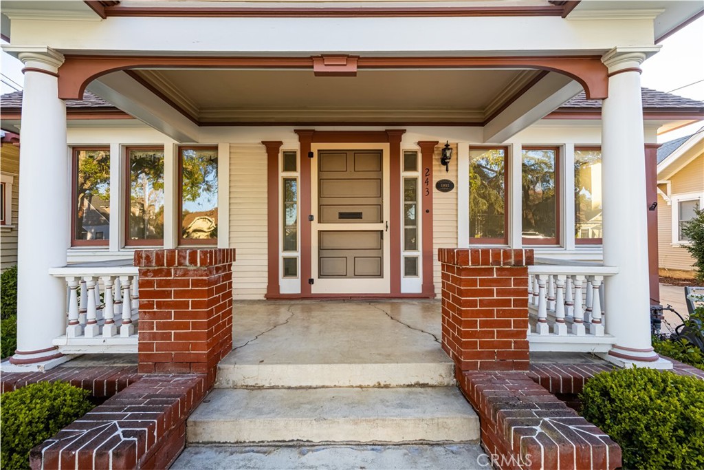 243 North Grand Street Orange, CA 92866 - Photo 3 of 25 a front view of a house with a lots of windows