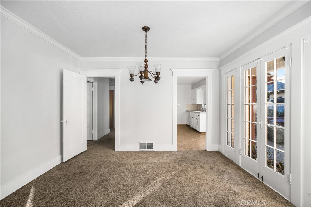 243 North Grand Street Orange, CA 92866 - Photo 8 of 25 a view of a room with a chandelier