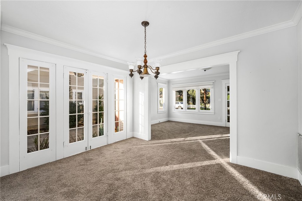 243 North Grand Street Orange, CA 92866 - Photo 9 of 25 a view of a livingroom with a ceiling fan and window