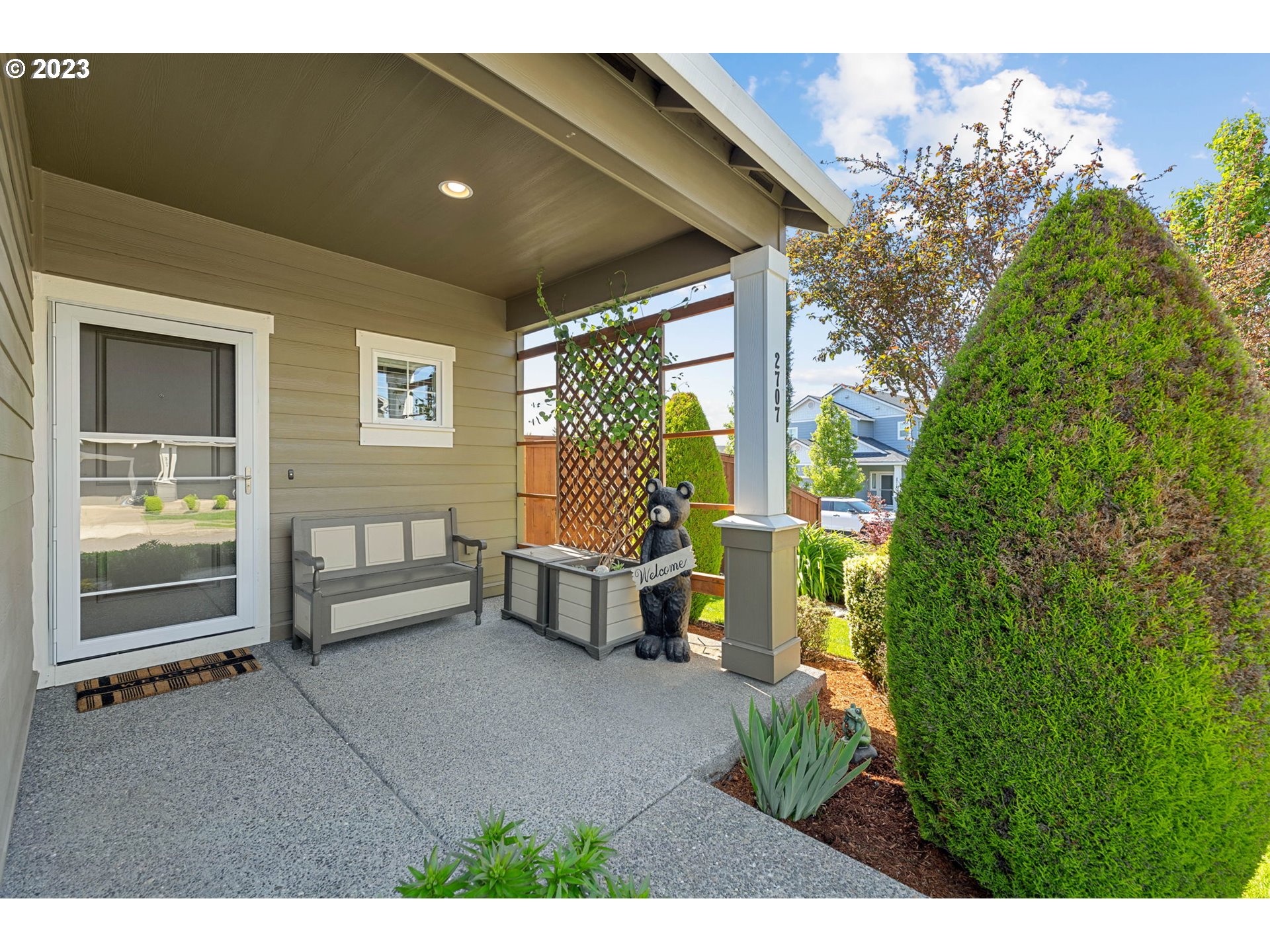 2707 South Red Tail Loop Ridgefield, WA 98642 - Photo 2 of 30 a backyard of a house with outdoor seating