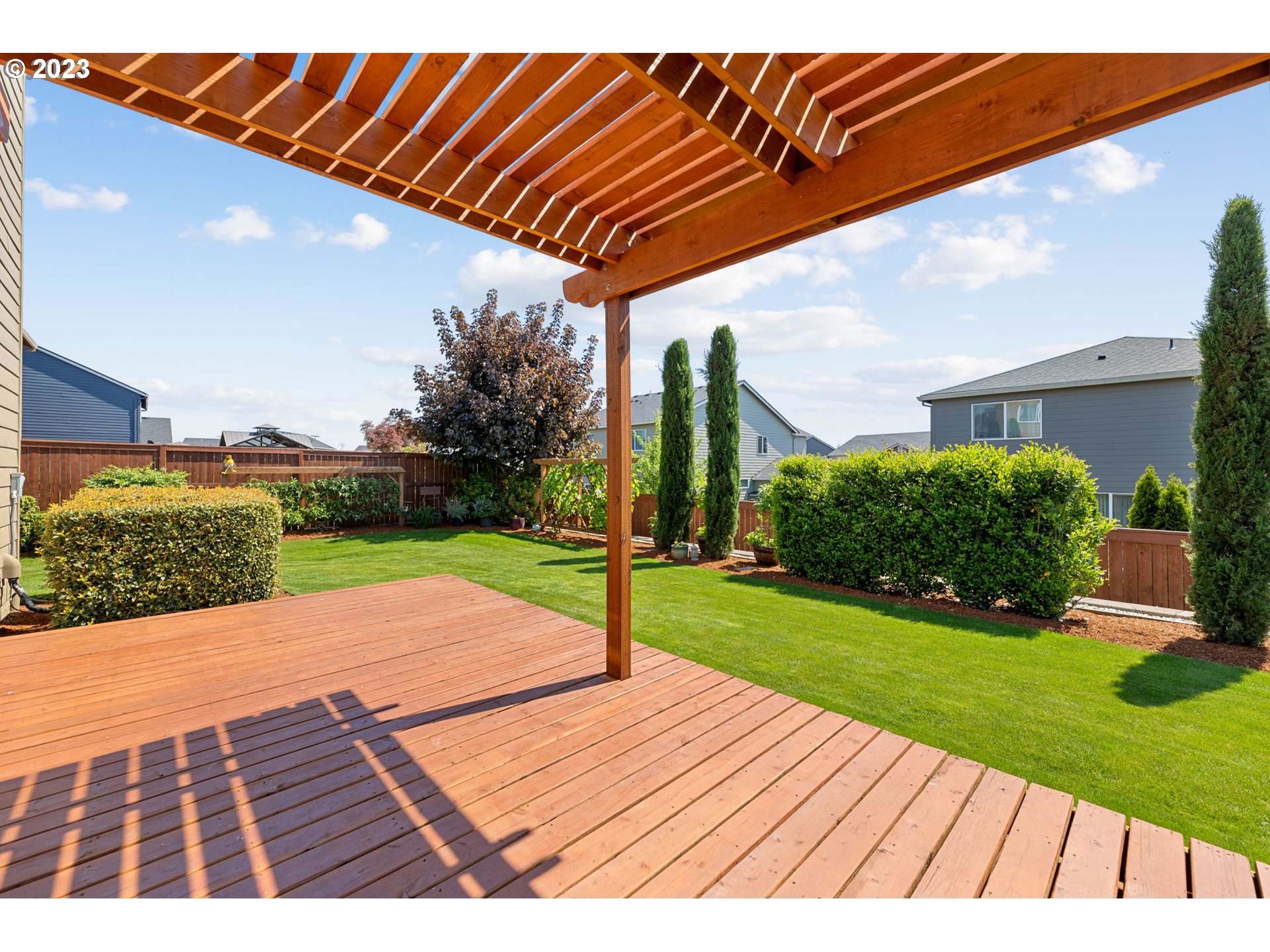 2707 South Red Tail Loop Ridgefield, WA 98642 - Photo 3 of 30 a view of a backyard with wooden floor