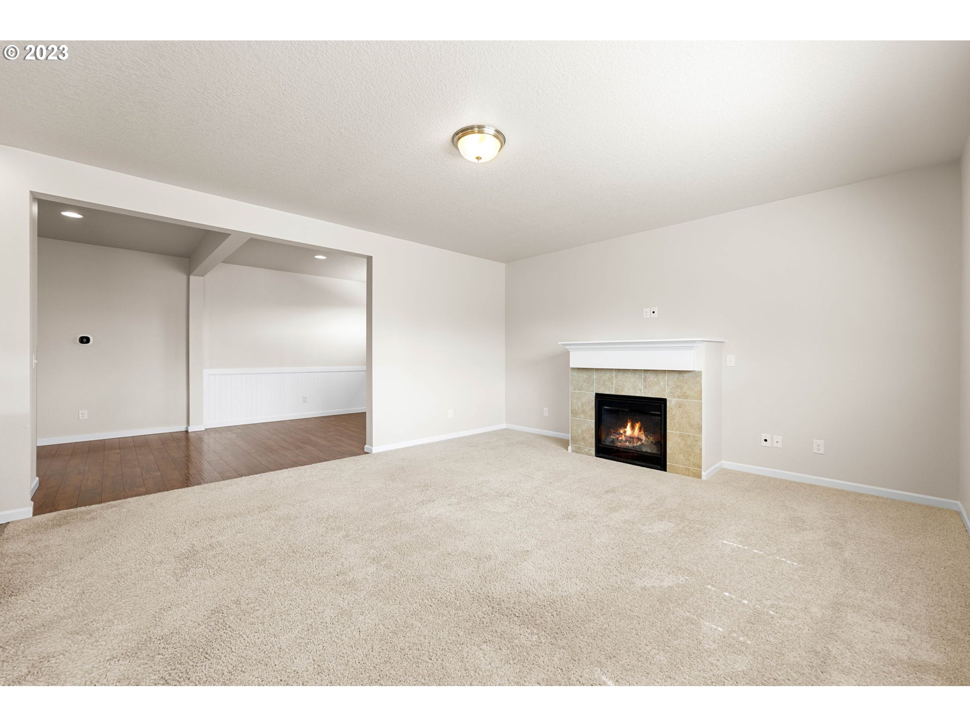2707 South Red Tail Loop Ridgefield, WA 98642 - Photo 10 of 30 a view of an empty room with a fireplace