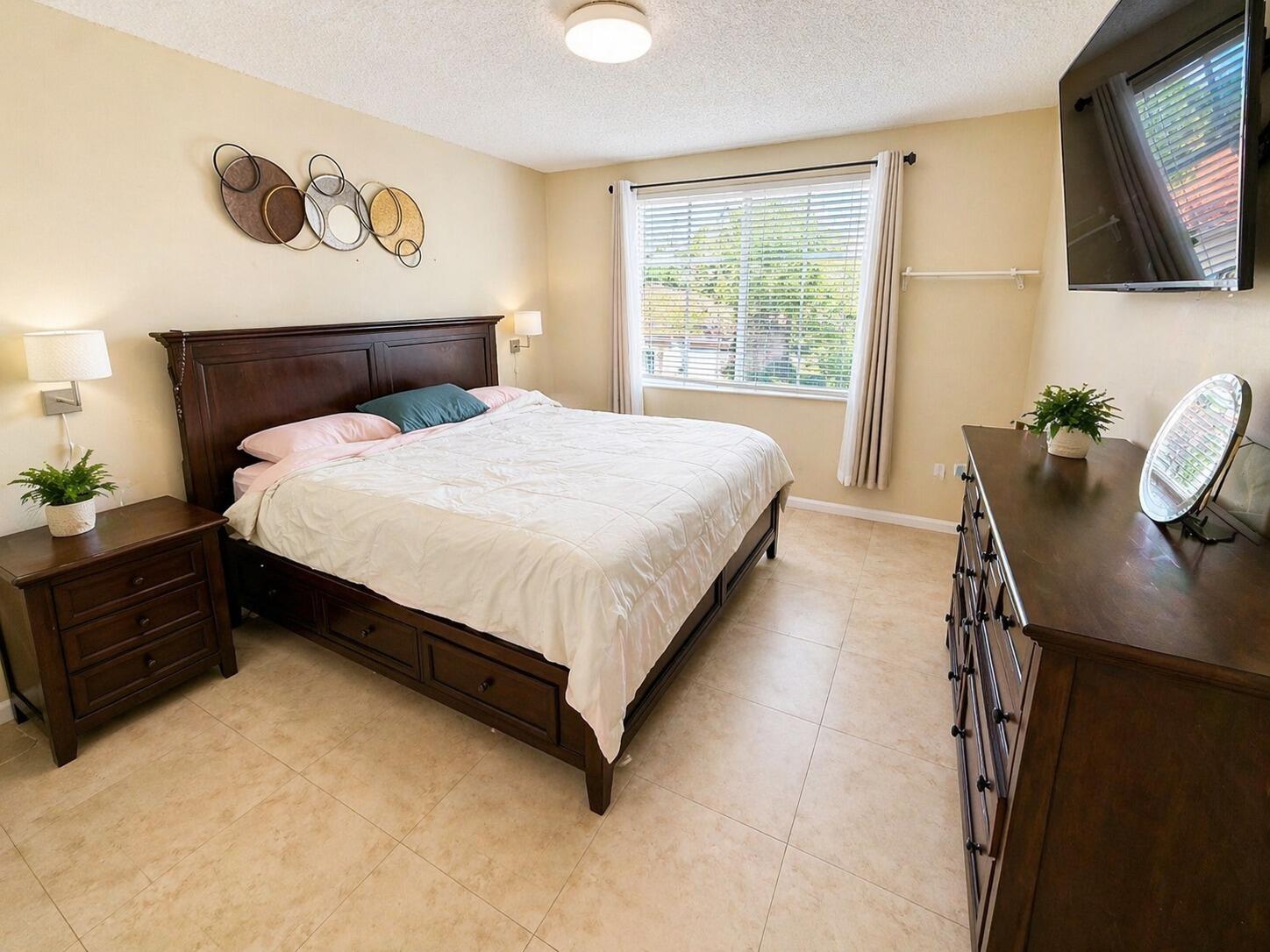 7980 North Nob Hill Road, Unit 205 Tamarac, FL 33321 - Photo 21 of 23 Master-Bedroom-with-King-Bed