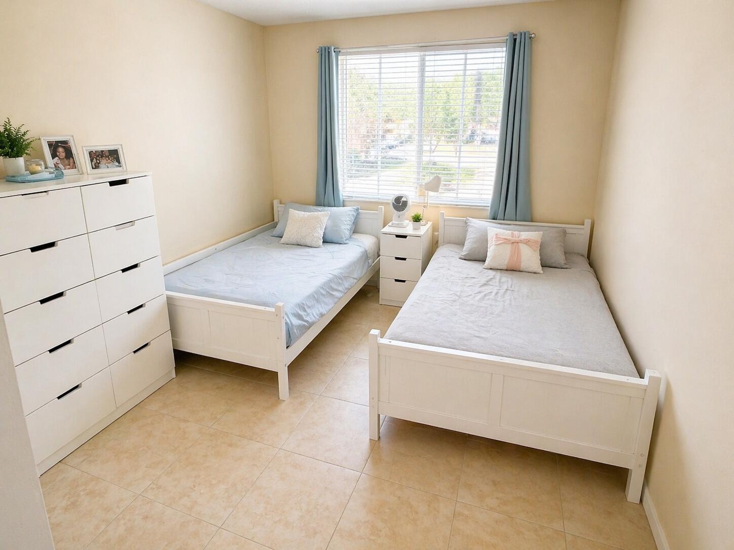 7980 North Nob Hill Road, Unit 205 Tamarac, FL 33321 - Photo 22 of 23 Second-Bedroom-with-Twin-Beds