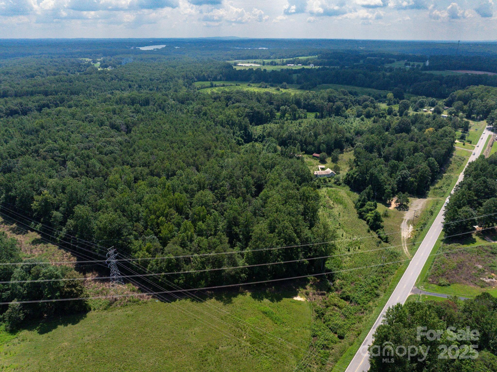 1708 Cherryville Road Cherryville, NC 28021 - Photo 3 of 10 a view of a lake with a yard