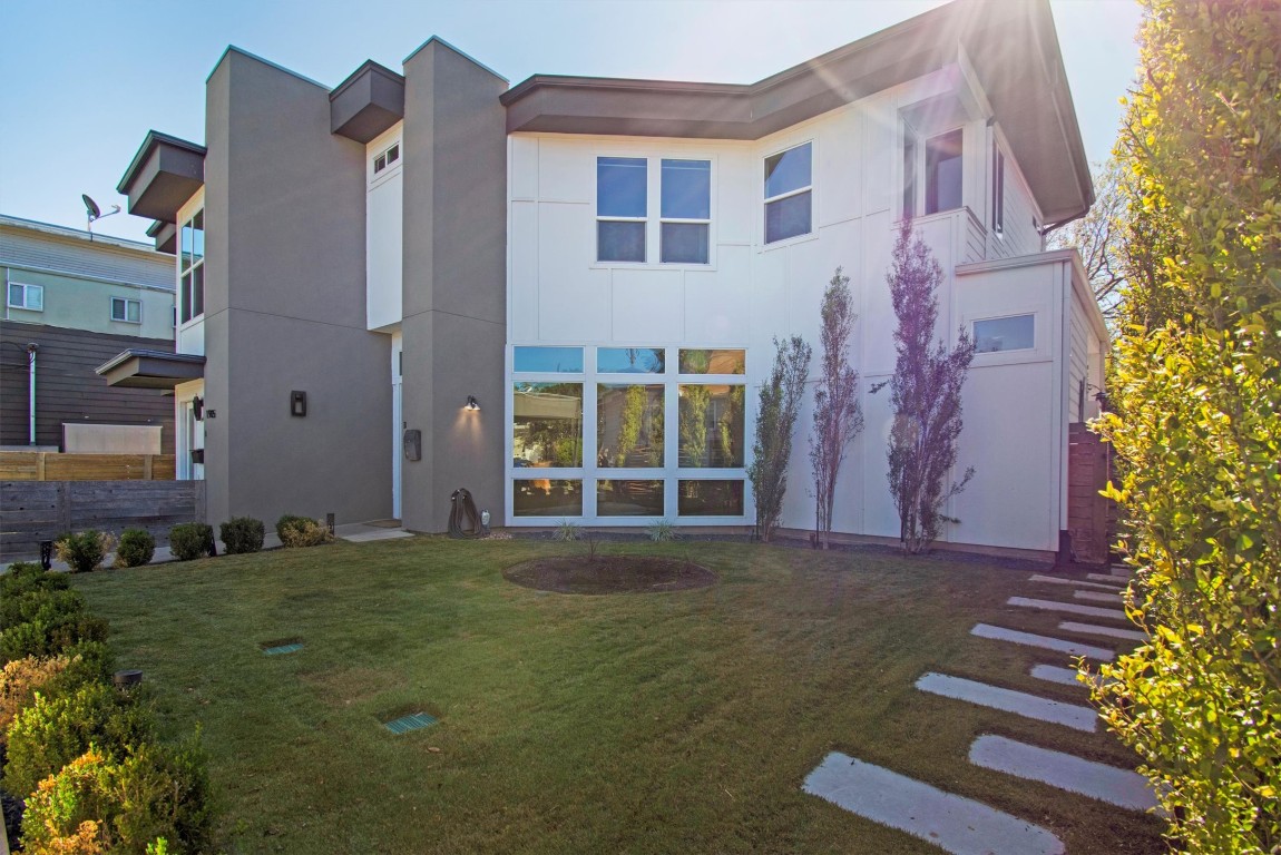 1905 Alegria Road, Unit B Austin, TX 78757 - Photo 22 of 25 Modern Curb Appeal – Sleek architectural lines, lush landscaping, and a covered parking area welcome you to this modern Crestview home. Designed for style and convenience, it offers both striking street presence and easy everyday living.