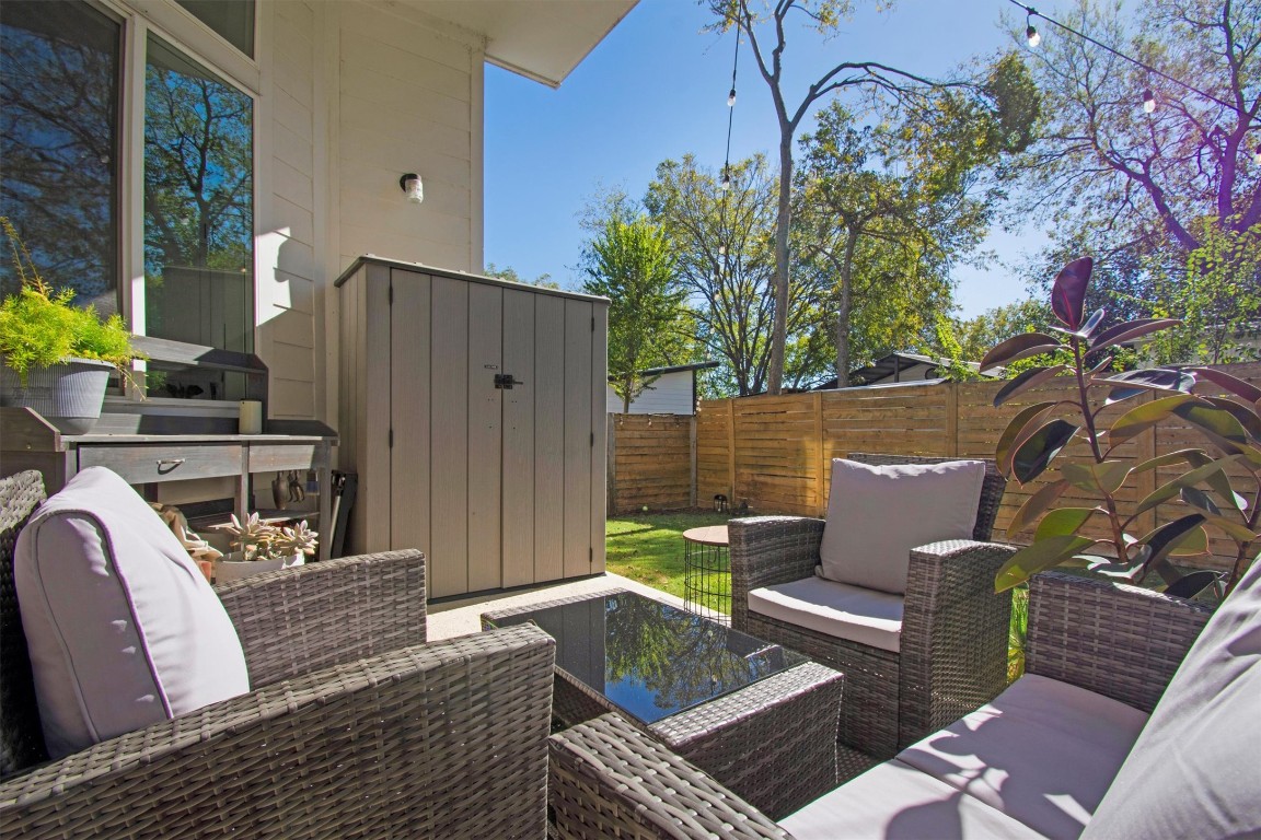 1905 Alegria Road, Unit B Austin, TX 78757 - Photo 24 of 25 Private Patio Retreat – Covered outdoor living area ideal for morning coffee, evening cocktails, or weekend lounging. Rare for central Austin, this private yard offers room to relax, garden, or let pets play freely.