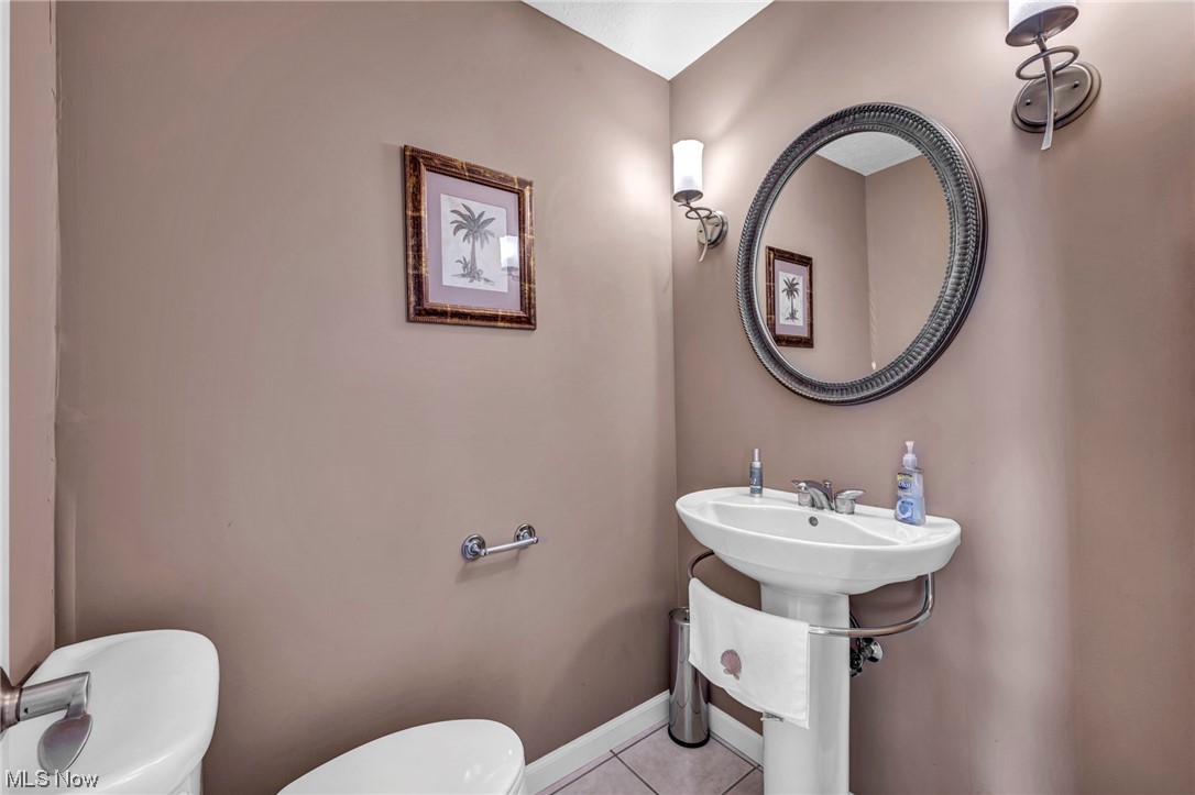 4741 Lake Road West Ashtabula, OH 44004 - Photo 29 of 43 Bathroom featuring tile flooring and toilet