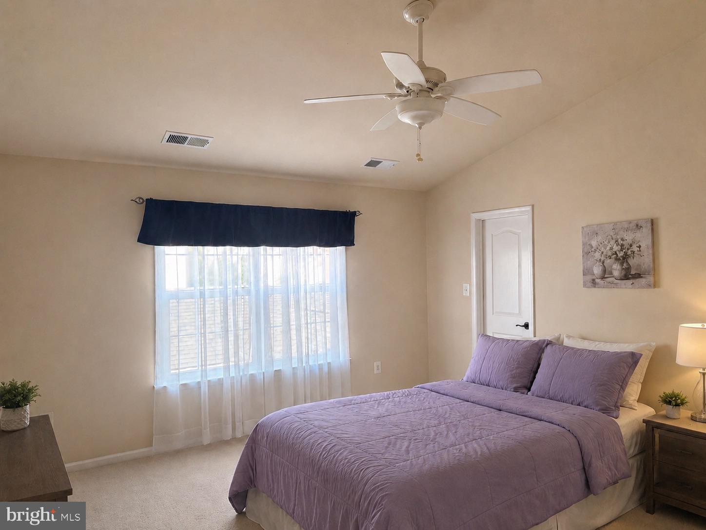 19400 Front Street Leesburg, VA 20176 - Photo 8 of 20 Serene bedroom with soft natural light.